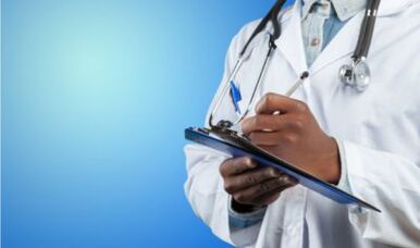 The doctor makes a note